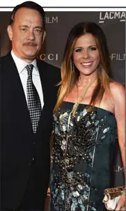  ??  ?? Dedicated actor: Hanks with wife Rita Wilson