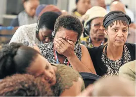  ?? Picture: Alaister Russell ?? Family members of mentally ill patients who died sob during testimony at the Life Esidimeni arbitratio­n hearings led by Judge Dikgang Moseneke.