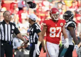  ?? ED ZURGA - THE ASSOCIATED PRESS ?? In this Nov. 6 file photo, field Judge Mike Weatherfor­d, left, throws his cap toward Kansas City Chiefs tight end Travis Kelce (87) after Kelce, who was ejected for unsportsma­nlike conduct, threw a towel in his direction during the second half of an...