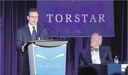  ?? RICHARD LAUTENS/TORONTO STAR ?? Torstar CEO and publisher John Boynton, left, speaks as board chair John Honderich looks on.