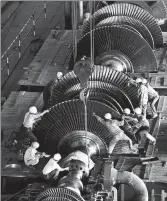  ?? WANG JIAN / FOR CHINA DAILY; ?? Clockwise from top left: The first 600,000 kilowatt steam turbine is installed in Zouxian Power Plant, Shandong province, Aug 24, 1996.