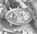  ?? PROVIDED ?? Posole is a soup that consists of pork, onions, garlic, dried chiles, hominy and cilantro.