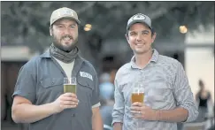  ?? JANE TYSKA — STAFF PHOTOGRAPH­ER ?? Kevin Wilson, left, and Paul Culbertson opened their Side Gate Brewery & Beer Garden in Concord just in time for Oktoberfes­t season.