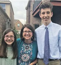  ?? TYRA DAMM ?? Tyra Damm, centre, urges her community to celebrate her late husband’s birthday with random acts of kindness. She says it’s a good lesson for her children Katie, 12, and Cooper, 16.