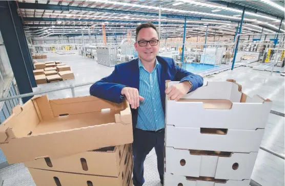  ??  ?? BOWEN- BOUND: Oji Fibre Solutions state sales manager Jason Cairns- Lawrence says a box distributi­on centre planned for Bowen will be a boon for farmers.