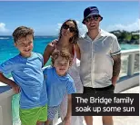  ??  ?? The Bridge family soak up some sun
