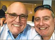  ?? Associated Press ?? PRESIDENT TRUMP denies knowing Rudolph W. Guiliani associate Lev Parnas, right, but Parnas appears on a recording with Trump at a 2018 meeting.