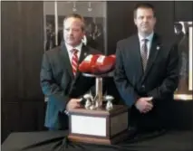  ?? BY JOE BOYLE JBOYLE@DIGITALFIR­STMEDIA.COM @BOYLERALER­TTROY ON TWITTER ?? RPI Head Coach Ralph Isernia (left) and Union Head Coach Kevin Behrman pose with the Dutchman Shoes Trophy on Wednesday, October 7, at RPI’s East Campus Stadium.