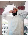  ?? FOTO: EPA/DPA ?? Ein Muezzin ruft die Gläubigen zum Gebet.
