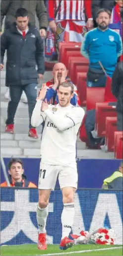  ??  ?? EL GESTO. Así celebró Bale su gol en el Wanda Metropolit­ano.