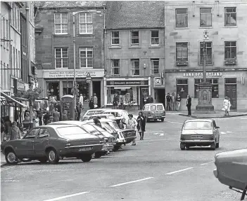  ??  ?? It’s 1977 and Cupar’s Crossgate is thriving.