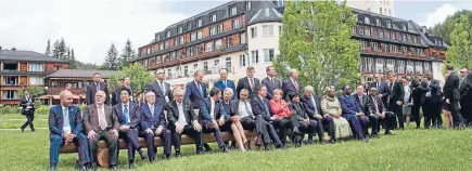  ?? Photo: REUTERS ?? German Chancellor Angela Merkel and other G7 summit participan­ts gather outside the Elmau castle in Kruen near Garmisch-Partenkirc­hen, Germany.