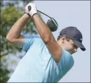  ?? AP photo ?? Patrick Reed hits on the 14th tee during the second round of the U.S. Open on Friday