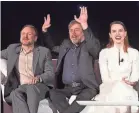  ?? CHARLEY GALLAY/GETTY IMAGES ?? Director Rian Johnson, left, with actors Mark Hamill and Daisy Ridley, said: “I’m like the new boyfriend at Thanksgivi­ng dinner.”