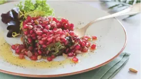  ??  ?? Above: Catalunya salad of pomegranat­e, fresh cheese, quince, ceps and pine nuts at the Hotel Empordà’s El Motel Restaurant