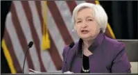  ?? The Associated Press ?? YELLEN: Federal Reserve Chair Janet Yellen speaks in Washington, Wednesday to announce the Federal Open Market Committee decision on interest rates following a two-day meeting. The Federal Reserve has raised its key interest rate for the third time in...
