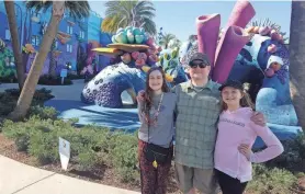  ?? AMY SCHWABE ?? Jonathan Schwabe and his daughters Alex and Wendy pose at a Disney hotel in January 2020, right before you-know-what changed everything.