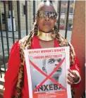  ?? PICTURE: ZELDA VENTER ?? UNBANNED: A demonstrat­or makes known her views on the controvers­ial movie Inxeba (The Wound), outside the Pretoria High Court.