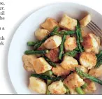  ?? Meredith Deeds/Special to the Star Tribune ?? Easy cheese dumplings in lemon-brown butter sauce with asparagus