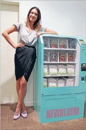  ?? Photo: DANIELLE STREET ?? Snappy nappies: Mother and entreprene­ur Sophia Nash has come up with a vending machine stocked with baby gear to help parents caught short in shopping malls.