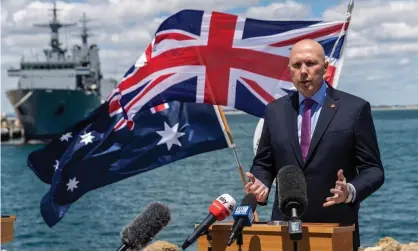  ?? Photograph: Richard Wainwright/EPA ?? Defence minister Peter Dutton speaks at the Perth navy base HMAS Stirling. ‘You don’t need astounding powers of political insight to pick up on the none-too-subtle hawkishnes­s that has imbued federal government rhetoric this year as tensions heighten between China and Taiwan.’