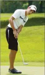  ?? DALE CLIFFORD
Examiner ?? Kawartha Golf and Country Club’s Jonah Allen-Mclean reacts to putt on the 18th hole of the Ontario men’s amateur qualifying tournament at the club on Monday.