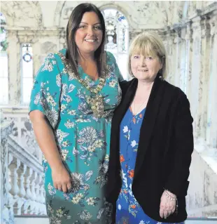  ??  ?? Belfast Lord Mayor Deirdre Hargey with mum Anne. Right, new Londonderr­y Mayor John Boyle with partner Angela