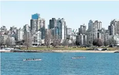  ?? POSTMEDIA NETWORK FILES ?? A view of Downtown Vancouver Skyline and English Bay from Vannier Park. Last summer, as policy makers grappled with how to tackle soaring real estate prices in the Vancouver and Toronto areas, they found there was no comprehens­ive database tracking all...