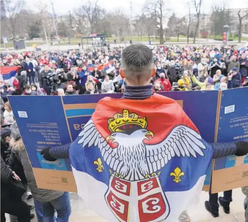  ?? AP ?? Supporters of Serbia’s Novak Djokovic gather to protest in Belgrade, Serbia, Thursday after the Australian government denies him entry to country.