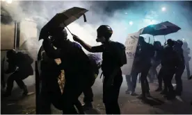  ?? Photograph: David Swanson/EPA ?? Protesters clash with local police and federal agents in Portland, Oregon, on 27 July.