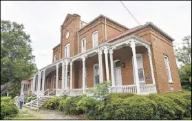  ?? HYOSUB SHIN / HSHIN@AJC.COM ?? Van Horn Hall (Building 41) at Fort McPherson was completed in 1889 as the original post headquarte­rs. It had office space, a library, mail and court martial room.