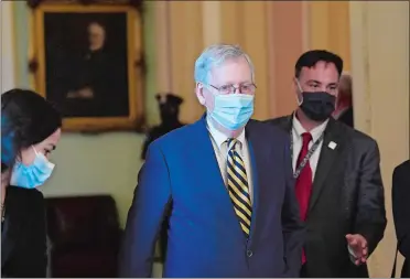  ?? SUSAN WALSH/AP PHOTO ?? Senate Majority Leader Mitch McConnell of Kentucky walks back to his office on Capitol Hill Monday in Washington.