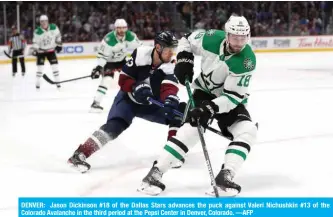 ??  ?? DENVER: Jason Dickinson #18 of the Dallas Stars advances the puck against Valeri Nichushkin #13 of the Colorado Avalanche in the third period at the Pepsi Center in Denver, Colorado. —AFP