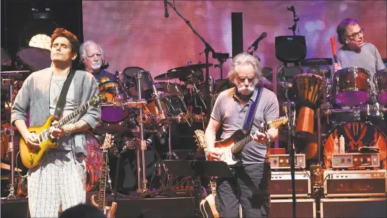  ?? Lori Van Buren / Albany Times Union ?? Dead & Company, including, from left, John Mayer, Bill Kreutzmann, Bob Weir and Mickey Hart, perform the song “Jack Straw” at Saratoga Performing Arts Center on June 11, 2018, in Saratoga Springs, N. Y.