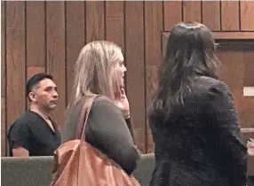  ??  ?? Manuel Duran listens as his defense attorney Ann Schiller (center) speaks during a court appearance on April 5. At right is immigratio­n lawyer Christina Swatzell. DANIEL CONNOLLY / THE COMMERCIAL APPEAL