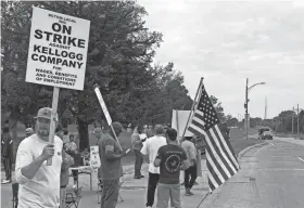  ?? GRANT SCHULTE/AP ?? Workers from a Kellogg’s cereal plant in Omaha, Neb., are among those on strike after a breakdown in contract talks with company management.