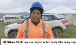  ?? ?? Fikiswa Zokufa can now provide for her family after being employed due to the constructi­on of the Msikaba bridge (on the left).