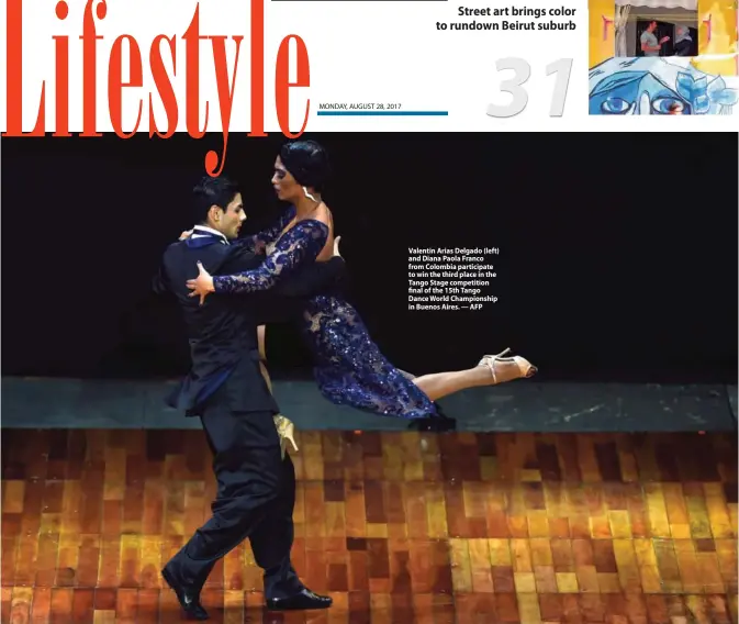  ??  ?? Valentin Arias Delgado (left) and Diana Paola Franco from Colombia participat­e to win the third place in the Tango Stage competitio­n final of the 15th Tango Dance World Championsh­ip in Buenos Aires. — AFP