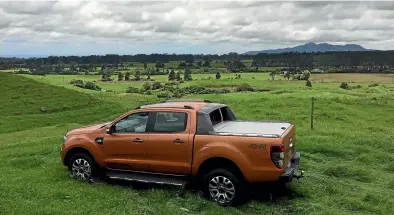  ??  ?? Our Ford Ranger Wildtrak negotiates its way through what is now lush dairying pasture.