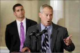  ?? MATT ROURKE — AP PHOTO ?? Pennsylvan­ia House Majority Leader Dave Reed, R-Indiana, looks on as Pennsylvan­ia House Speaker Mike Turzai, R-Allegheny, speaks with members of the media Wednesday, at the state Capitol in Harrisburg. Gov. Tom Wolf’s hopes of ending Pennsylvan­ia’s...