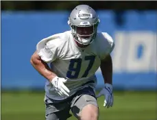  ?? PAUL SANCYA — THE ASSOCIATED PRESS ?? Detroit Lions defensive end Aidan Hutchinson works out during a practice earlier this month in Allen Park.