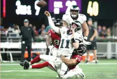  ?? (Reuters) ?? PHILADELPH­IA EAGLES quarterbac­k Carson Wentz (11) threw a pair of intercepti­ons and was sacked three times by the Atlanta Falcons defense, while falling short on a late drive deep in Atlanta territory, as the host Falcons beat the Eagles 24-20.