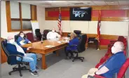  ?? (NWA Democrat-Gazette/Mike Eckels) ?? Decatur’s City Council observes covid-19 protocol during its May 11 meeting in the conference room at city hall. Council members James Jensen (right), Danny Harrington (left), Sandy Duncan, Mayor Bob Tharp, and City Clerk Kim Wilkins were joined via Zoom by Ladale Clayton, Linda Martin, city attorney Michael Nutt, and Fire Chief Jeremy Luker.