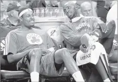  ??  ?? ASSOCIATED PRESS FILES Boston will be starting over without perennial All-Stars Paul Pierce (left) and Kevin Garnett after the Celtics reached a deal to trade them to the Brooklyn Nets.