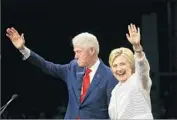  ?? Carolyn Cole Los Angeles Times ?? BILL CLINTON, with wife Hillary in June, received unpreceden­ted fees and a lot of perks for his speeches. His staff also screened audience questions in advance.