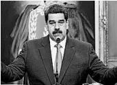  ?? YURI CORTEZ/GETTY-AFP ?? The U.S. will offer cash rewards for informatio­n leading to the arrests of Venezuela’s Nicolas Maduro and his aides.