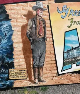  ?? Joe Holley / Houston Chronicle ?? From a mural in downtown Alpine, Brewster County Sheriff E.E. Townsend still keeps an eye on things.