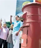  ??  ?? AN UNCLEARED post box at Kollam, Kerala, on May 26, when the strike was on.