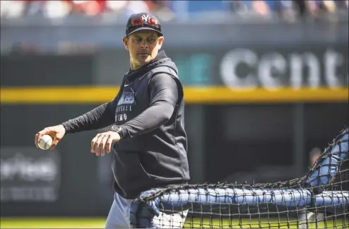  ?? Mark Brown / Getty Images ?? New York Yankees manager and Greenwich resident Aaron Boone joined a group of Cannons players on a Zoom meeting last week.