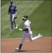  ?? TONY AVELAR — THE ASSOCIATED PRESS ?? The Oakland A’s Seth Brown (15) rounds the bases after hitting a two-run home run against the Tampa Bay Rays during the first inning Saturday in Oakland.